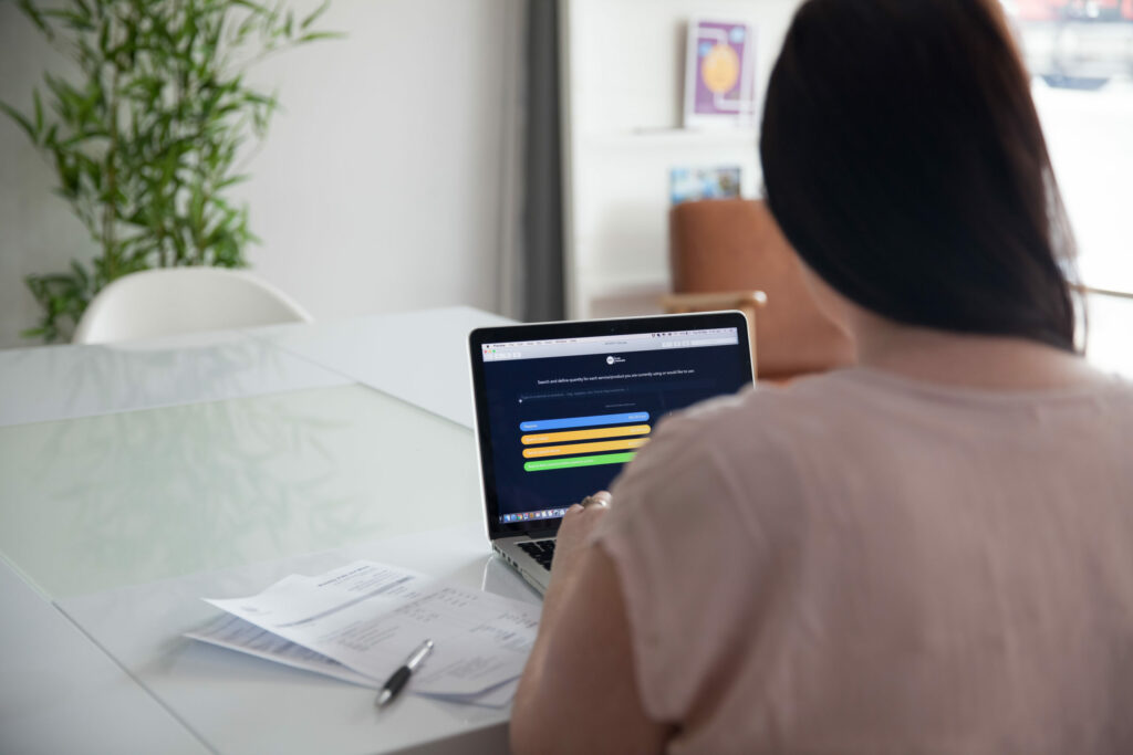 Woman sitting at a laptop