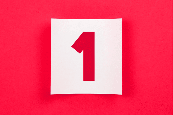 The number 1 on a pink background.