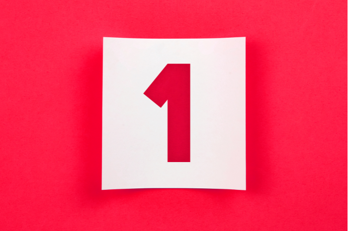 The number 1 on a pink background.