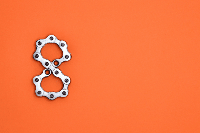 The number eight on an orange background.