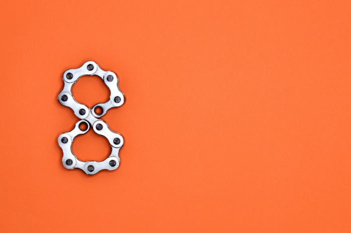 The number eight on an orange background.