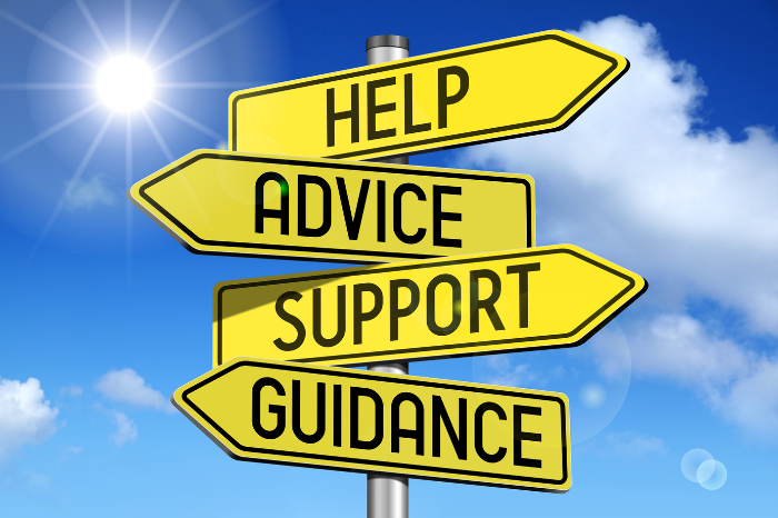 Street signs that reads 'HELP, ADVICE, SUPPORT, GUIDANCE'.
